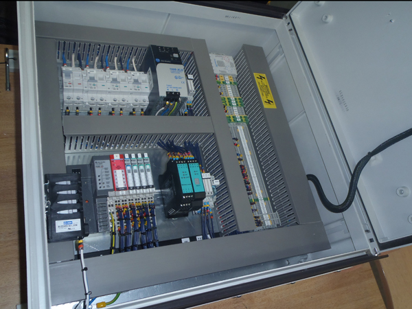 PLC and electrical control equipment inside a Practicon control panel